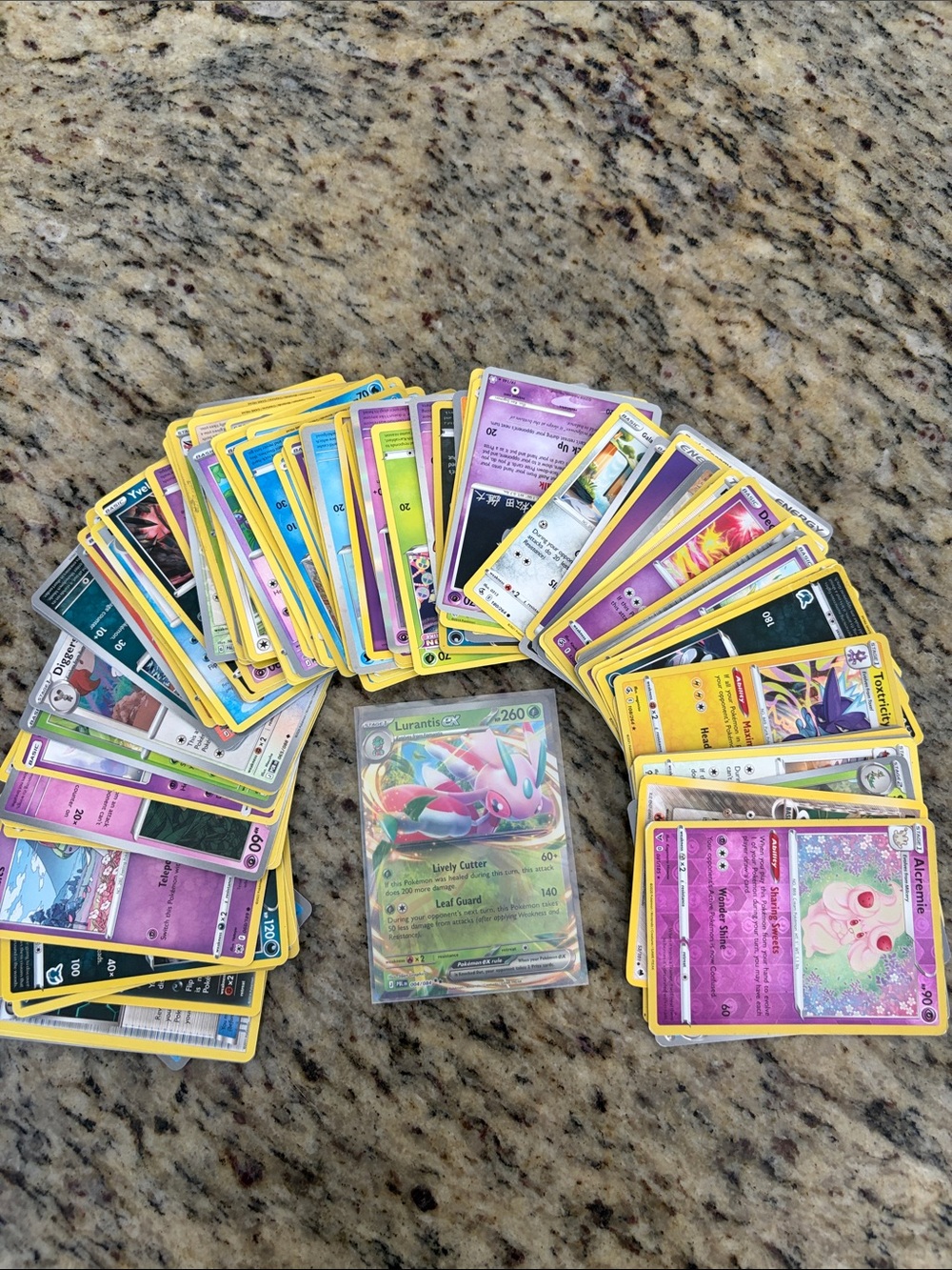 Pokemon Trading Cards Pack with Green Lurantis Holo and Yellow-Edged Cards